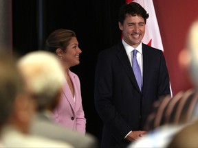 Prime Minister Justin Trudeau shares a laugh with his wife Sophie Gregoire Trudeau as he delivers remarks at the Laurier Club donor appreciation reception at the Delta Victoria Ocean Pointe in Victoria, B.C.