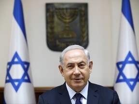Israeli Prime Minister Benjamin Netanyahu attends the weekly cabinet meeting in Jerusalem, Sunday,  July 30, 2017