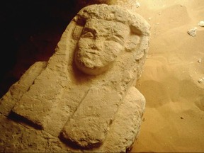 This undated photo released by the Egyptian Ministry of Antiquities shows a sarcophagi in a Ptolemaic tomb in an area known as al-Kamin al-Sahraw, in the Nile Valley province of Minya south of Cairo. Egypt's antiquities ministry says that archaeologists have discovered three tombs dating back more than 2,000 years, from the Ptolemaic Period. (Egyptian Ministry of Antiquities via AP)