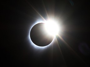 The moon moves over the sun at the end of a total eclipse of the sun near Ririe Reservoir Idaho on August 21, 2017.