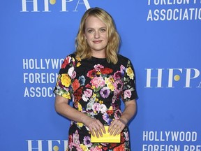 Elisabeth Moss arrives at the Hollywood Foreign Press Association Grants Banquet at the Beverly Wilshire Hotel on Wednesday, Aug. 2, 2017, in Beverly Hills, Calif. (Photo by Jordan Strauss/Invision/AP)