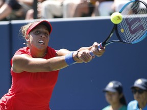 Madison Keys, of the United States, returns to Coco Vandeweghe, of the United States, during the finals of the Bank of the West Classic tennis tournament in Stanford, Calif., Sunday, Aug. 6, 2017. (AP Photo/Tony Avelar)