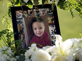 FILE - This July 19, 2017, file photo shows a portrait of 5-year-old Aramazd Andressian Jr. at a memorial service at the Los Angeles County Arboretum in Arcadia, Calif. Aramazd Andressian Sr., who admitted killing his son amid a contentious custody battle, is scheduled to be sentenced Wednesday, Aug. 23, facing a maximum term of 25 years to life in prison. Andressian's attorney said his client pleaded guilty partly to avoid the possibility of prosecutors adding a charge that could result in the death penalty. (Leo Jarzomb /Los Angeles Daily News/SCNG via AP, File)