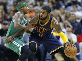 All-star guards Kyrie Irving of the Cleveland Cavaliers, right, and Isaiah Thomas of the Boston Celtics switched teams in  a huge trade consummated between the teams on Tuesday.