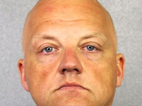 FILE - This January 2017 file photo provided by the Broward County Sheriff's Office shows German Volkswagen executive Oliver Schmidt. Schmidt, a former manager of a VW engineering office in suburban Detroit, pleaded guilty Friday, Aug. 4, 2017, to conspiracy and fraud charges in Detroit in a scheme to cheat emission rules on nearly 600,000 diesel vehicles. (Broward County Sheriff's Office via AP, File)
