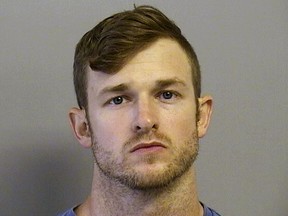 FILE - This July 11, 2017, file photo provided by the Tulsa County Sheriffs Office shows Benjamin Don Roden, an ex-Air Force airman who is accused of setting off a pipe bomb July 10 outside at an Air Force recruiting center in suburban Tulsa, Okla., was indicted by a federal grand jury. The seven-count indictment charges include malicious damage to federal property by use of an explosive and possession of unregistered destructive devices. (Tulsa County Sheriffs Office via AP, File)