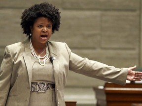FILE - In this Sept. 10, 2014, file photo, Missouri state Sen. Maria Chappelle-Nadal speaks on the Senate floor in Jefferson City, Mo. Chappelle-Nadal says she posted and then deleted a comment on Facebook that said she hoped for President Donald Trump's assassination. The Democratic Senator says she didn't mean what she posted Thursday, Aug. 17, 2017, but was frustrated with the president's reaction to the violence last weekend in Charlottesville, Va.(AP Photo/Jeff Roberson, File)