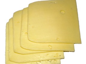 Slices of Emmental cheese.