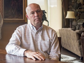 FILE - In this June 20, 2017 file photo, Rep.-elect Greg Gianforte responds to questions at his home in Bozeman, Mont., about an election-eve confrontation with a reporter. A judge has ordered Gianforte to be photographed and fingerprinted for assaulting a reporter, opening the possibility of the congressman's mug shot to be used by political opponents next year when Gianforte is up for re-election. (AP Photo/Bobby Caina Calvan, File)