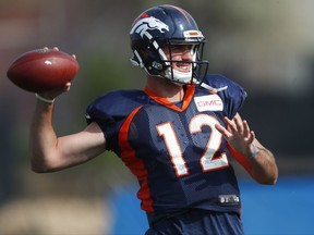 Denver Broncos quarterback Paxton Lynch throws a pass during an NFL football training camp. Saturday, Aug. 5, 2017, in Englewood, Colo. (AP Photo/David Zalubowski)