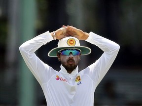 Sri Lanka's captain Dinesh Chandimal reacts to a delivery during their second cricket test match against India in Colombo, Sri Lanka, Friday, Aug. 4, 2017. (AP Photo/Eranga Jayawardena)