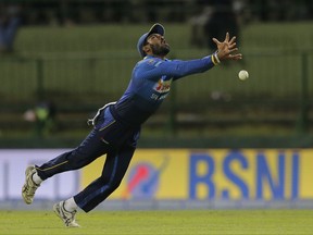 Sri Lanka's Chamara Kapugedera drops a catch after a shot played by India's Rohit Sharma during their third one-day international cricket match in Pallekele, Sri Lanka, Sunday, Aug. 27, 2017. (AP Photo/Eranga Jayawardena)