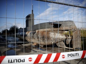 In this Tuesday, Aug. 22, 2017 photo, a private submarine sits on a pier in Copenhagen harbor, Denmark