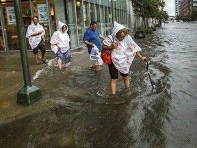 Parts of New Orleans flooded after a heavy weekend rainfall that officials said overwhelmed the city's pump stations.