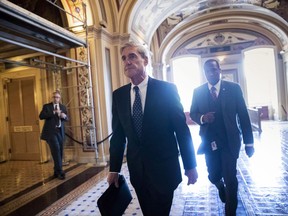 Special Counsel Robert Mueller departs the Capitol after a closed-door meeting with members of the Senate Judiciary Committee in Washington, Wednesday, June 21, 2017. The waters of the so-called swamp are starting to rise around Donald Trump, with various creatures of Washington's political marshes threatening his presidency from multiple angles. THE CANADIAN PRESS/AP-J. Scott Applewhite