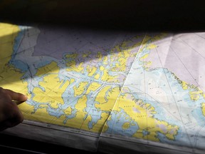 A map of the Canadian Arctic archipelago is shown as the Finnish icebreaker MSV Nordica traverses the Northwest Passage, Monday, July 24, 2017. The federal government and Inuit groups are celebrating a deal on the boundaries of what will be Canada's largest national marine conservation area.Lancaster Sound on the eastern gate of the Northwest Passage teems with fish, whales and seabirds, and Inuit have fought to preserve it for decades.THE CANADIAN PRESS/AP/David Goldman