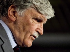 Senator Romeo Dallaire announces he will retire from the Senate during a news conference on Parliament Hill in Ottawa on Wednesday, May 28, 2014. Retired general and senator Dallaire says Canada should finally embrace ballistic missile defence. THE CANADIAN PRESS/Adrian Wyld