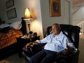 In this photo taken Saturday, March 2, 2013, Dr. Arthur Porter speaks with a reporter at his home in Nassau, Bahamas. Criminal charges against the man accused of committing what Quebec authorities described as the biggest corruption fraud in Canada's history have officially been abandoned, two years after his death. THE CANADIAN PRESS/AP-Jeff Todd