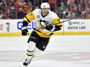 In this Oct. 29, 2016, file photo, Pittsburgh Penguins' Matt Cullen skates toward the action during an NHL hockey game against the Philadelphia Flyers, in Philadelphia. The Minnesota Wild and centre Cullen have agreed to a one-year, $1 million contract, bringing him back to his home state for a 21st season in the NHL. THE CANADIAN PRESS/ AP/Derik Hamilton, File