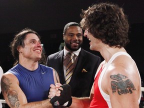 Conservative Senator Patrick Brazeau congratulates Liberal MP Justin Trudeau after their charity boxing match for cancer research Saturday, March 31, 2012 in Ottawa. Justin Trudeau says he "regrets" comments he made about Sen. Patrick Brazeau in a recent interview with Rolling Stone magazine. THE CANADIAN PRESS/Fred Chartrand