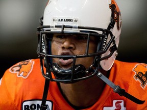 B.C. Lions' Arland Bruce celebrates his touchdown against the Saskatchewan Roughriders during the second half of a CFL football game in Vancouver, B.C., on Sunday August 19, 2012. Arland Bruce III says in court documents that he continues to suffer post-concussive symptoms, including depression, paranoia, delusions and other medical issues. He played for 13 years with several CFL teams. THE CANADIAN PRESS/Darryl Dyck