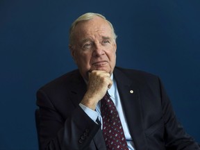 Former prime minister Paul Martin poses for a portrait following an interview with The Canadian Press in Ottawa, Thursday May 12, 2016. Martin says he thinks a $10.5-million federal payout to Omar Khadr could have been avoided had Ottawa dealt with the situation differently from the start.THE CANADIAN PRESS/Adrian Wyld