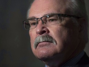 Gerry Ritz speaks with the media in the Foyer of the House of Commons in Ottawa, Thursday October 27, 2016