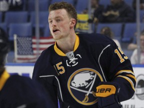 Buffalo Sabres forward Jack Eichel (15) skates prior to the first period of an NHL hockey game against the Toronto Maple Leafs, Monday, April 3, 2017, in Buffalo, N.Y. A person familiar with negotiations tells The Associated Press the Sabres and Eichel are discussing a contract extension that could run the NHL maximum eight years. THE CANADIAN PRESS/AP/Jeffrey T. Barnes