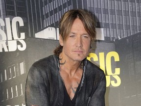 Keith Urban arrives at the CMT Music Awards at Music City Center on Wednesday, June 7, 2017, in Nashville, Tenn. THE CANADIAN PRESS/AP-Photo by Sanford Myers/Invision/AP