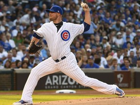 Chicago Cubs starting pitcher Jon Lester (34) delivers during the first inning of a baseball game against the Arizona Diamondbacks on Tuesday, Aug. 1, 2017, in Chicago. (AP Photo/Matt Marton)