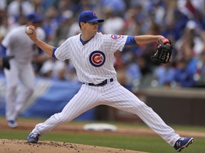 Chicago Cubs starter Kyle Hendricks delivers a pitch during the first inning of a baseball game against the Washington Nationals Friday, Aug. 4, 2017, in Chicago. (AP Photo/Paul Beaty)