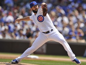 Chicago Cubs starter Jake Arrieta delivers a pitch during the first inning of a baseball game against the Toronto Blue Jays, Friday, Aug. 18, 2017, in Chicago. (AP Photo/Paul Beaty)