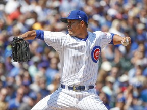 Chicago Cubs starting pitcher Jose Quintana throws against the Toronto Blue Jays during the first inning of a baseball game, Saturday, Aug. 19, 2017, in Chicago. (AP Photo/Kamil Krzaczynski)