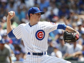 Chicago Cubs starting pitcher Kyle Hendricks throws against the Toronto Blue Jays during the first inning of a baseball game, Sunday, Aug. 20, 2017, in Chicago. (AP Photo/Kamil Krzaczynski)
