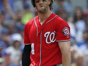 Washington Nationals' Bryce Harper reacts after striking out swinging during the fifth inning of a baseball game against the Chicago Cubs, Saturday, Aug. 5, 2017, in Chicago. (AP Photo/Nam Y. Huh)