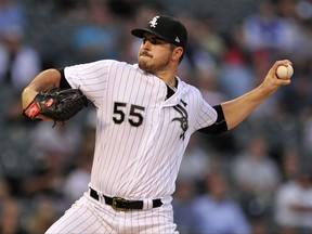 Chicago White Sox starter Carlos Rodon delivers a pitch during the first inning of the team's baseball game against the Houston Astros on Thursday, Aug. 10, 2017, in Chicago. (AP Photo/Paul Beaty