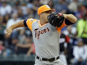 Detroit Tigers starting pitcher Buck Farmer throws against the Chicago White Sox during the first inning of a baseball game Saturday, Aug. 26, 2017, in Chicago. (AP Photo/Nam Y. Huh)