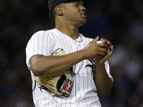 Chicago White Sox starting pitcher Reynaldo Lopez reacts after Kansas City Royals' Mike Moustakas hit a solo home run during the fourth inning of a baseball game Friday, Aug. 11, 2017, in Chicago. (AP Photo/Nam Y. Huh)