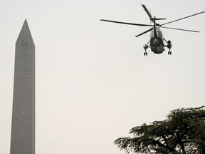 Marine One, with President Donald Trump aboard, departs the White House in Washington, Tuesday, Aug. 22, 2017, for a short trip to Andrews Air Force Base, Md. and then onto Yuma, Ariz. to visit the U.S. border with Mexico and attend a rally in Phoenix. (AP Photo/Andrew Harnik)