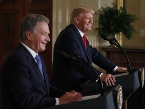 President Donald Trump and Finland President Sauli Niinisto smile in a joint news conference Monday, Aug. 28, 2017, in the East Room of the White House in Washington. (AP Photo/Carolyn Kaster)