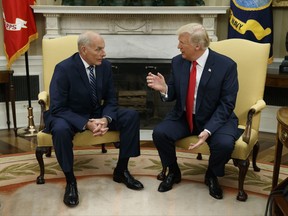 President Donald Trump talks with new White House Chief of Staff John Kelly after he was privately sworn in during a ceremony in the Oval Office with President Donald Trump, Monday, July 31, 2017, in Washington.