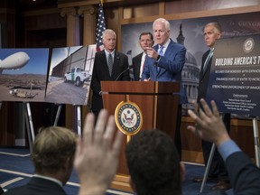 Senate Majority Whip John Cornyn of Texas, joined by, from left, Senate Homeland Security and Governmental Affairs Chairman Sen. Ron Johnson, R-Wis., Sen. John Barrasso, R-Wyo., and Sen. Thom Tillis, R-N.C., speaks to reporters at a news conference on border security, Thursday, Aug. 3, 2017, on Capitol Hill Washington. (AP Photo/J. Scott Applewhite)