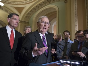 Senate Majority Leader Mitch McConnell of Ky., joined by, from left, Sen. John Barrasso, R-Wyo., and Sen. Roy Blunt, R-Mo., holds his first news conference since the Republican health care bill collapsed last week due to opposition within the GOP ranks, Tuesday, Aug. 1, 2017, on Capitol Hill Washington. (AP Photo/J. Scott Applewhite)