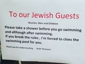 A photo of a sign at a Swiss hotel asking "Jewish guests" to take a shower before swimming. The hotel has since taken it down.