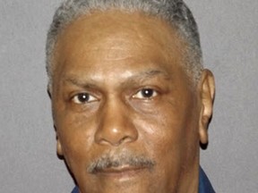In a photo provided by the Michigan Department of Corrections, Richard Phillips is shown. Phillips, imprisoned 45 years is on the cusp of freedom after another man said he had no role in a 1971 murder in Detroit. A judge last week threw out Phillips' conviction and ordered a new trial. It's not clear if prosecutors will take that step or drop the case. Phillips has declared his innocence for decades. He's been cleared based on the words of Richard Palombo, who was a co-defendant at the 1972 trial. Palombo admitted his role in the shooting during a parole board hearing in 2010, but he insisted that Phillips wasn't present. Four years later, University of Michigan law school learned about Palombo's testimony and successfully reopened the case. (Michigan Department of Corrections via AP)