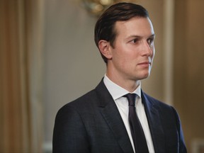 FILE - In this Friday, Aug. 11, 2017 file photo, White House senior adviser Jared Kushner listens as President Donald Trump answer questions regarding the ongoing situation in North Korea, at Trump National Golf Club in Bedminster, N.J. The Palestinians are hoping for some clear answers from the U.S. when White House envoy Jared Kushner returns to the region this week. Kushner, who is Trump's son-in-law, is expected to meet with Israeli and Palestinian officials on Thursday, Aug. 24, 2017, as he tries to restart talks. (AP Photo/Pablo Martinez Monsivais, File)