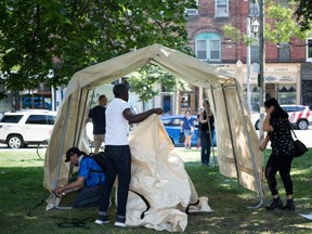 People set up a pop up safe injection site in Moss Park. Toronto, ON.