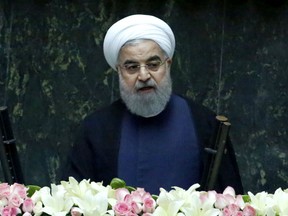 Iran's President Hassan Rouhani delivers a speech after being sworn in before parliament in Tehran, on August 5, 2017. Rouhani warned the US against tearing up the nuclear deal as he was inaugurated for a second term, but he also faces challenges closer to home amid accusations he is rolling over to conservatives. /