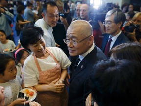 Canadian pastor Hyeon Soo Lim is greeted by members of his congregation at the Light Korean Presbyterian Church in Mississauga on August 13, 2017 after being freed from a North Korean labour camp last week.