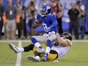 New York Giants quarterback Josh Johnson (8) is sacked by Pittsburgh Steelers linebacker T.J. Watt (90) during the first quarter of a preseason NFL football game, Friday, Aug. 11, 2017, in East Rutherford, N.J. (AP Photo/Bill Kostroun)